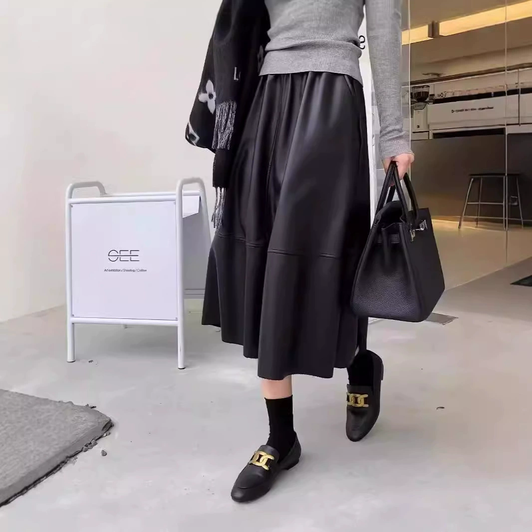 Юбка из натуральной кожи для женщин, осень 2025, новая модель с высокой талией, утягивающая, свободного кроя, из козьей кожи, на эластичной резинке, средней длины.