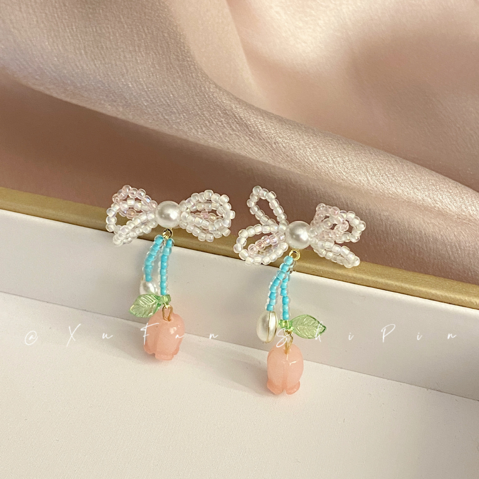 韩国新款蝴蝶结铃兰花耳环女 小众设计小清新米珠花朵气质耳钉