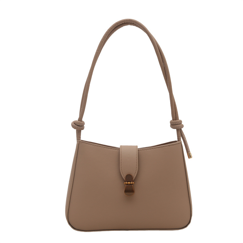 Bolsa de brazo retro para mujeres 2025 primavera nueva bolsa de moda pequeña bolsa de viaje coreana simple bolsa de hombro extranjera