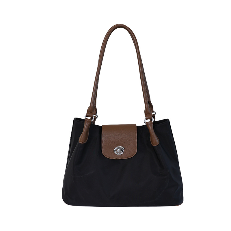 Bolsos de alta calidad de gran capacidad para mujeres 2026 nueva moda moda de nylon ligero de viaje de hombro bolso axilar