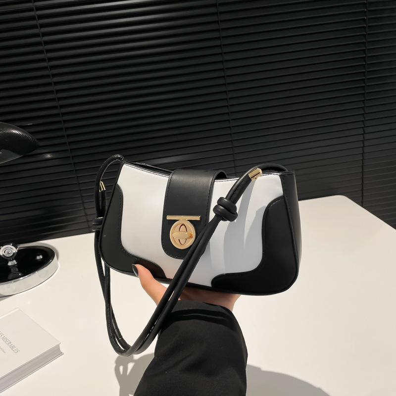 Bolsos debajo de las axilas mujeres 2024 invierno nueva moda de nicho simple diseño de hombro bolso retrógrado bolso pequeño