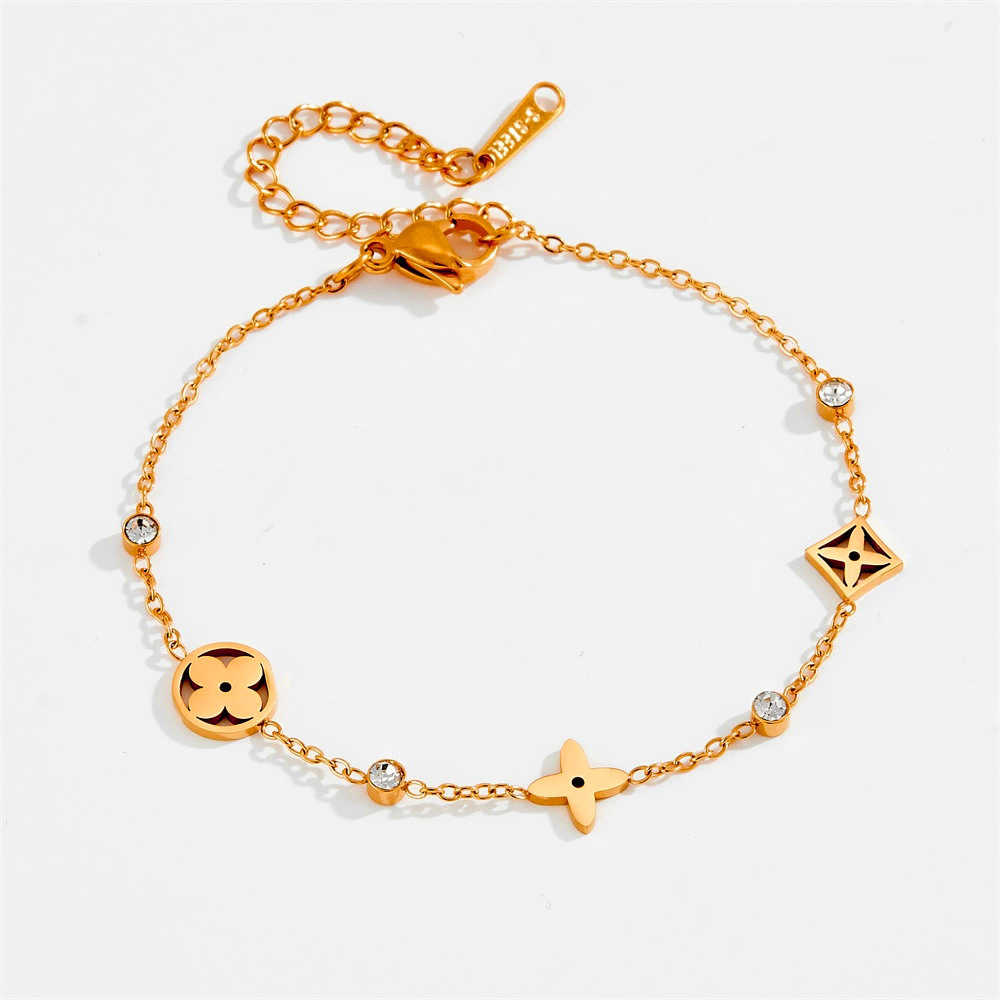 Múltiples huecos de salida afortunado de cuatro hojas de la flor de la pulsera femenina 18K chapado en oro rosa estilo coreano simple de acero de titanio accesorios no se desvanecen