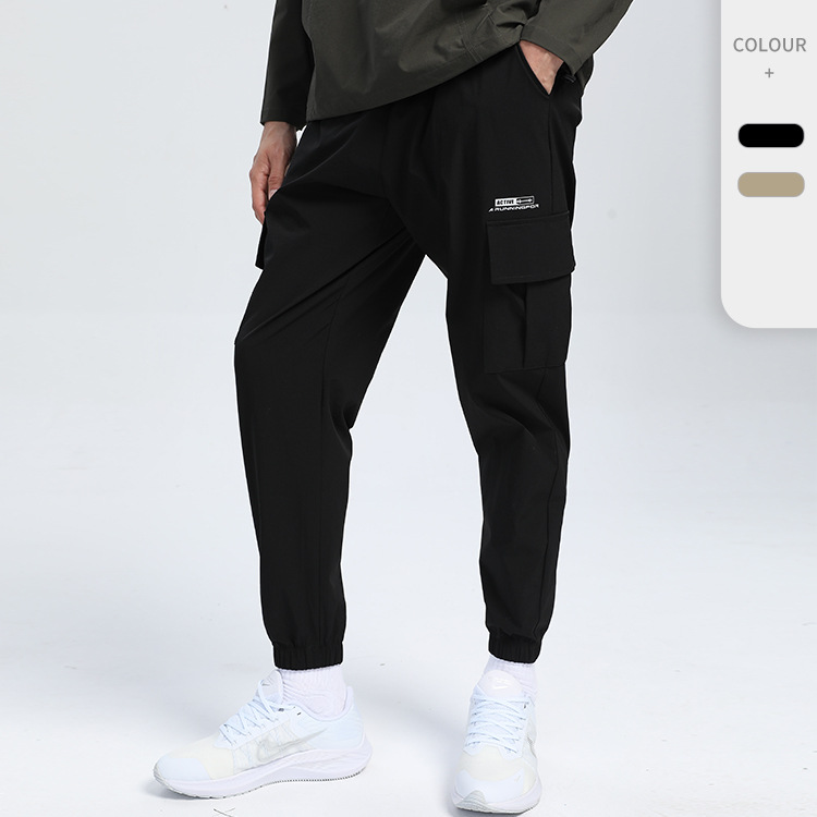 Pantalones de chándal primavera hombres al aire libre Secadores rápidos tejido suelto estiramiento pie fitness Baloncesto Pantalones casual