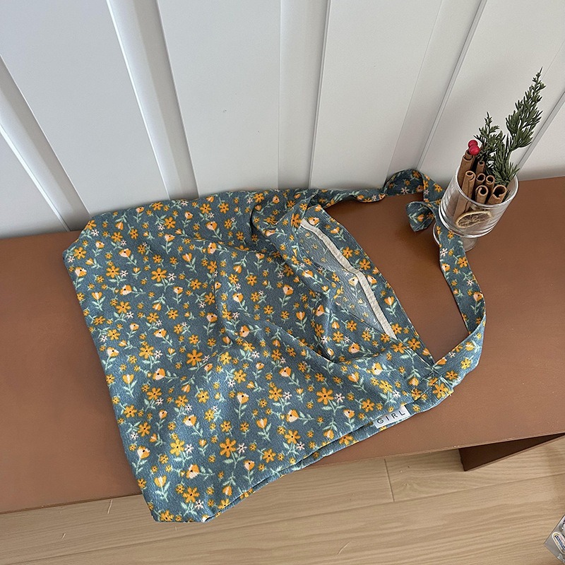 Diseño nicho bolsas de lona para mujeres 2025 nueva gran capacidad coreana estampado de leopardo flor de hombro impresa bolsas de mujer