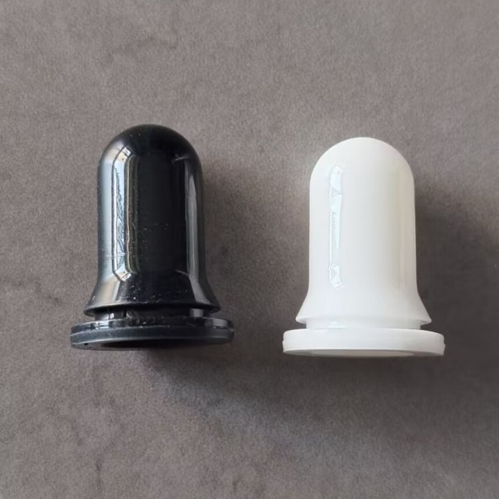 Wholesale stock: 18-tooth and 20-tooth silicone caps for essential oil bottles, glass dropper caps, corrosion-resistant black and white nipple caps, and nitrile rubber caps