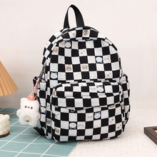 书包女2023新款大容量可爱格子印花少女双肩包初中生小学生书包