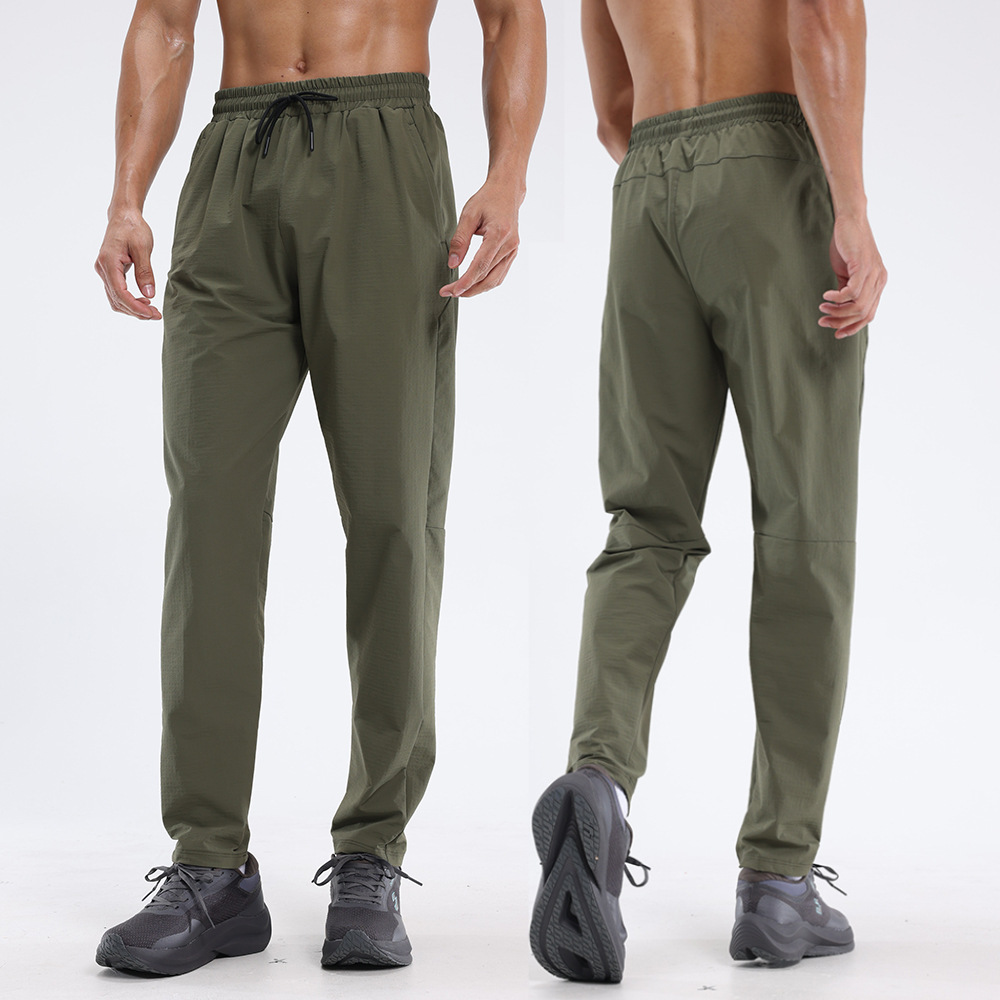 Dijia Running Sports Pantalones de entrenamiento para hombres, pantalones de tejido transpirables y rápidos, pantalones casuales impermeables y húmedos.