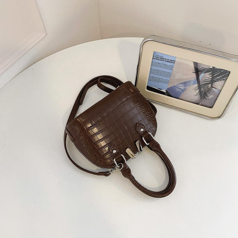 Verano estampado de piedra sensación diaria bolso de mano para mujeres 2026 nueva moda viaje bolsa de hombro bolsa de concha de tramo inclinado