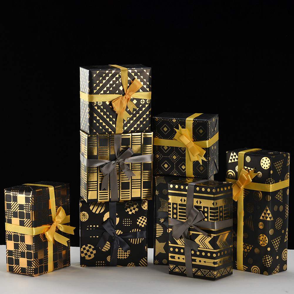 Nuevo papel de embalaje de caja de regalo grueso fondo negro estampado dorado estrella puntos rayas de papel de embalaje de regalo roll