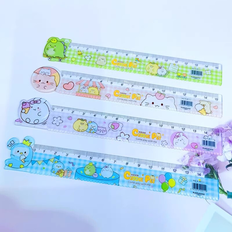 外国貿易サンリオ創意アニメの形は学生15cmで波の定規を測っています。小学生は文房具を勉強しています。|undefined