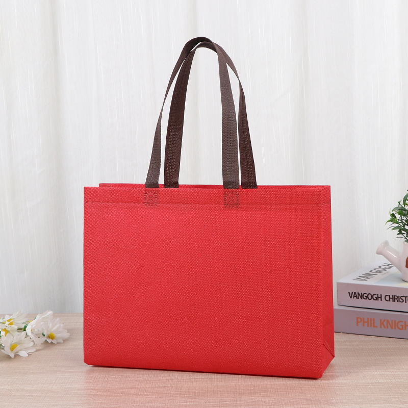 Bolsas de tela no tejida tiendas de souvenirs de viajes de madres y bebés en línea bolsa de compras de mano engrosada bolsa de mano image 3