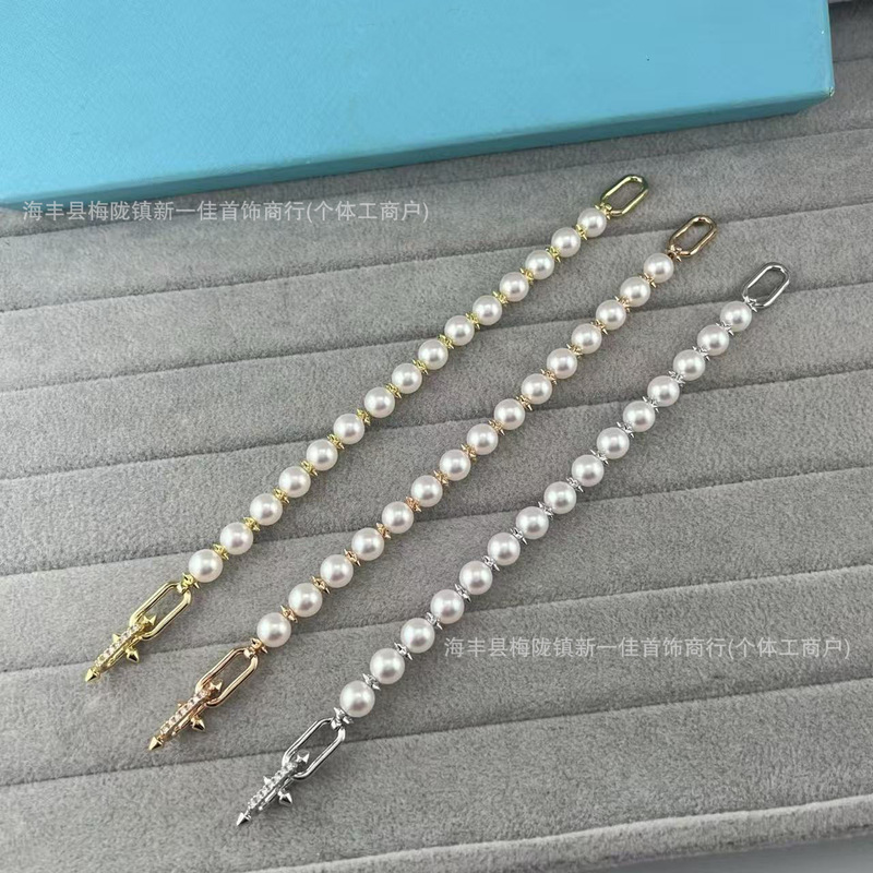 High-end T-brand trident nail chain pearl bracelet for women, plated with 18K gold, a luxurious and fashionable piece of jewelry with a high-end European and American style
