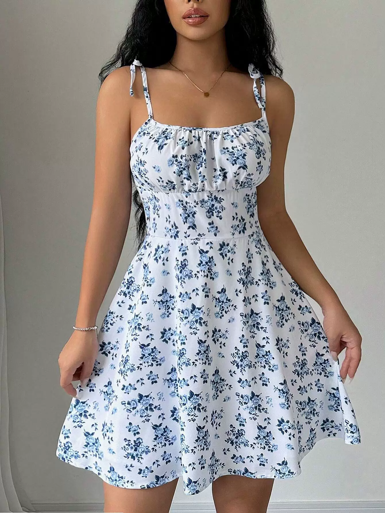 2026 summer new European and American women's clothing hot item floral suspender short dress square neck gentle style short skirt