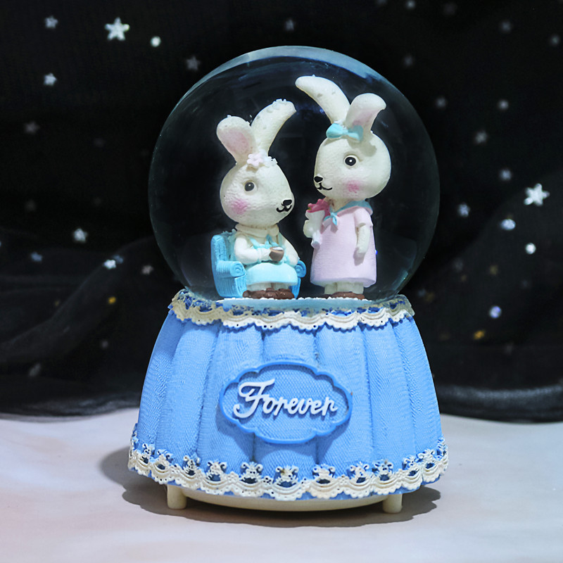 Nueva bola de cristal de mapache rosa pequeña, nieve, caja de música luminosa, luz nocturna, caja de música de regalo, artesanía de una pieza