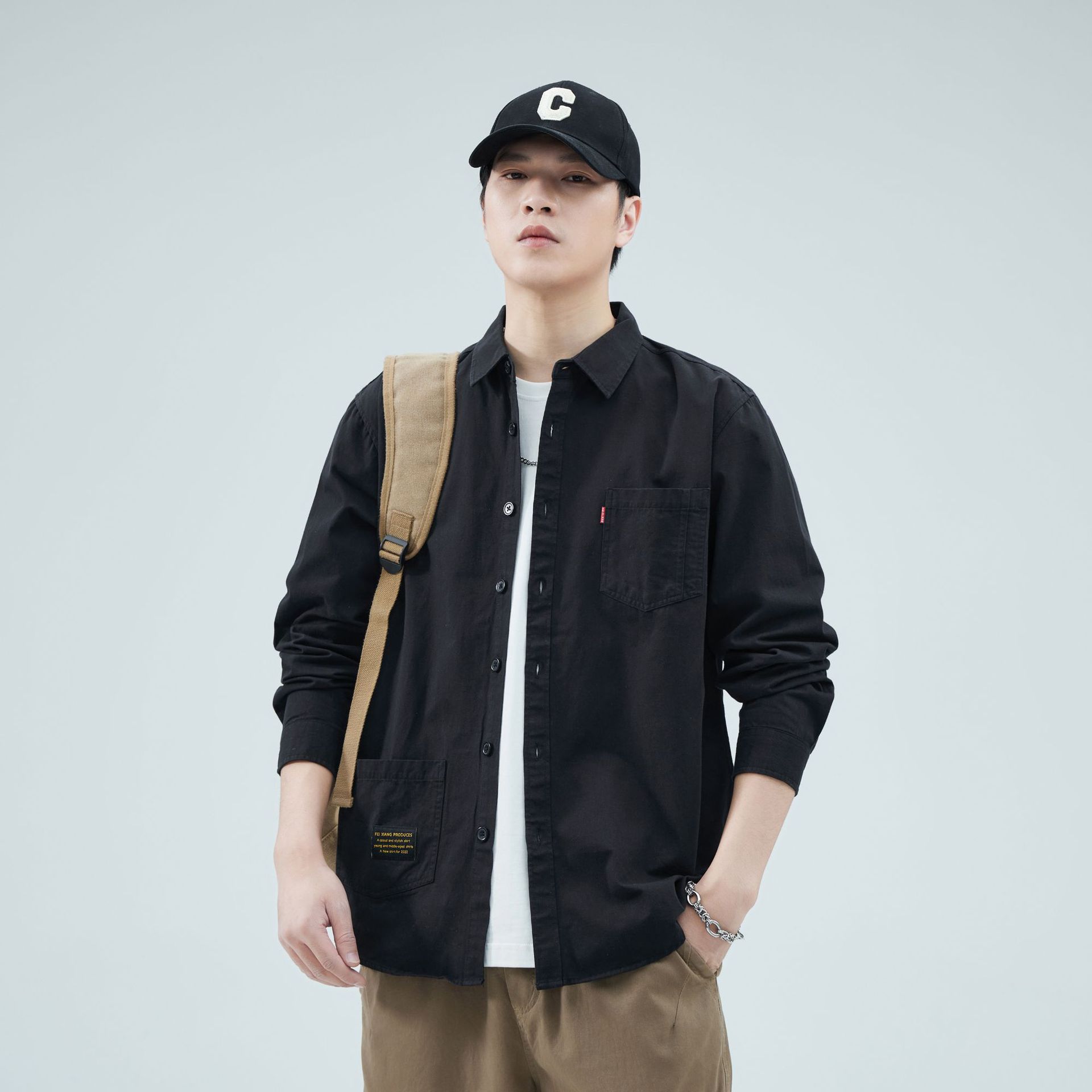 Camisas personalizadas de fábrica para hombres primavera y verano algodón de manga larga tendencia de ropa de estilo americano con solapa de bolsas de moda de ropa de estilo