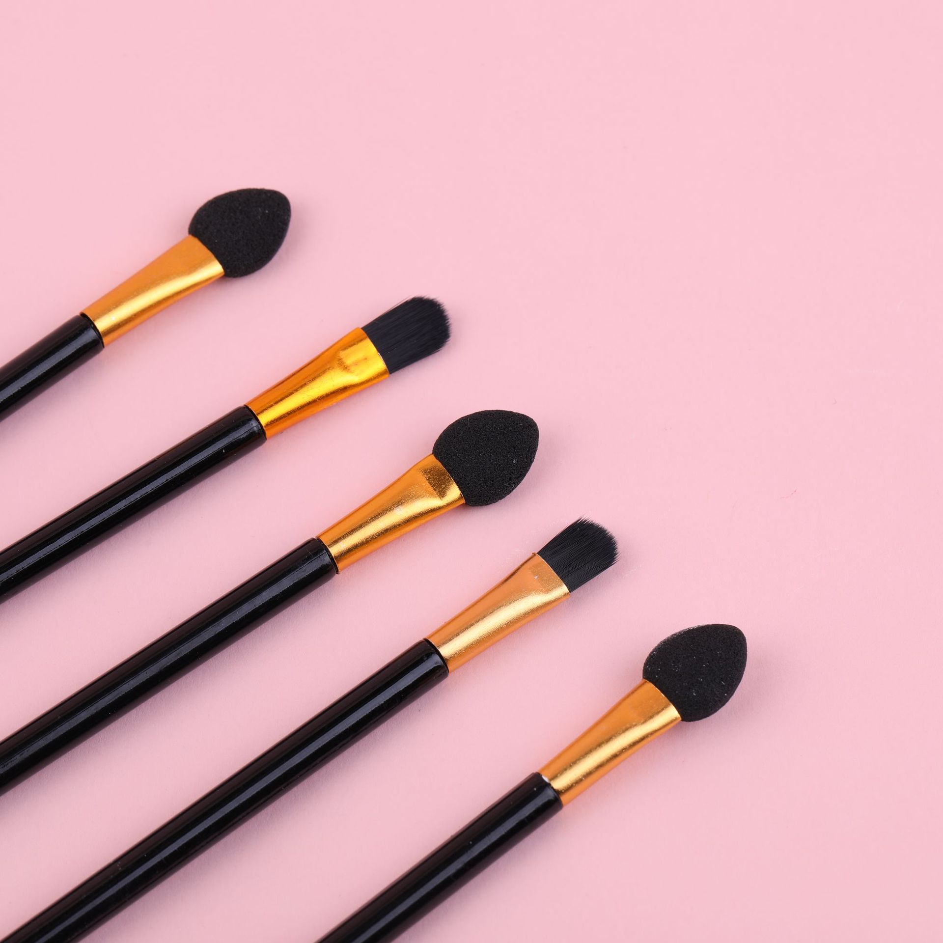 Double-sided handheld brush
