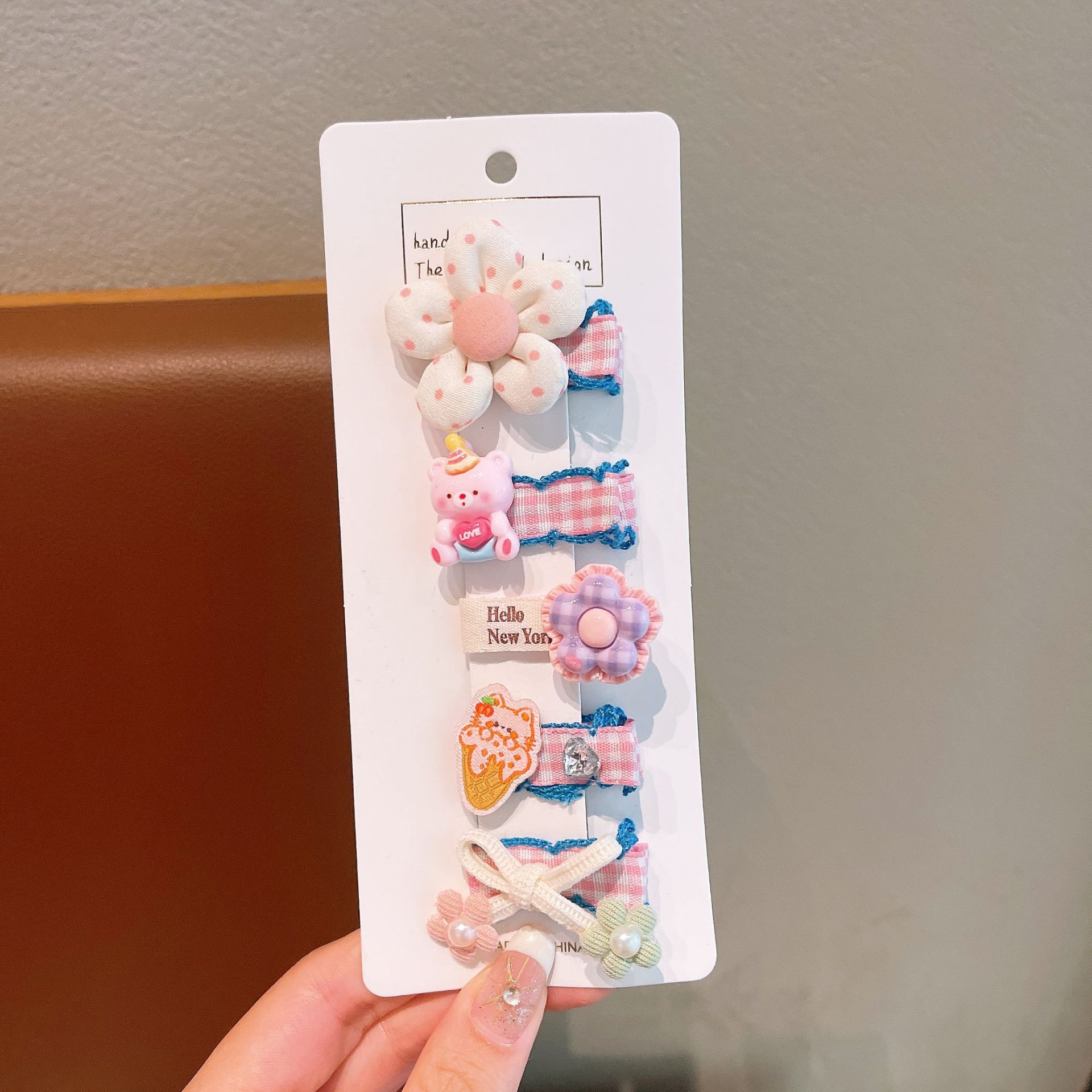 Nuevo pequeño botón de metal perfumado para niños anillo de cabello personalidad widgets niñas atar cabello cuerdas de cabello adornamientos para el cabello