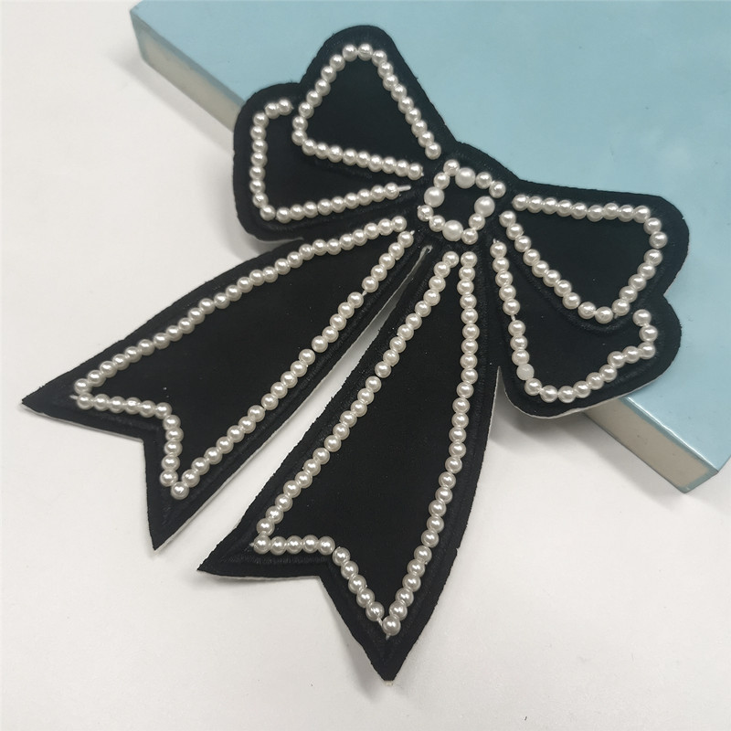 厂家现货韩版手工缝珍珠蝴蝶结章仔布贴箱包发夹饰品DIY服装辅料