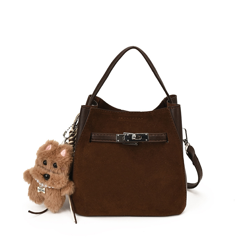 Bolsa de mano coreana retro de tería para mujeres 2025 nuevo tipo de bolso casual versátil, bolso de cubo de viaje de alta calidad