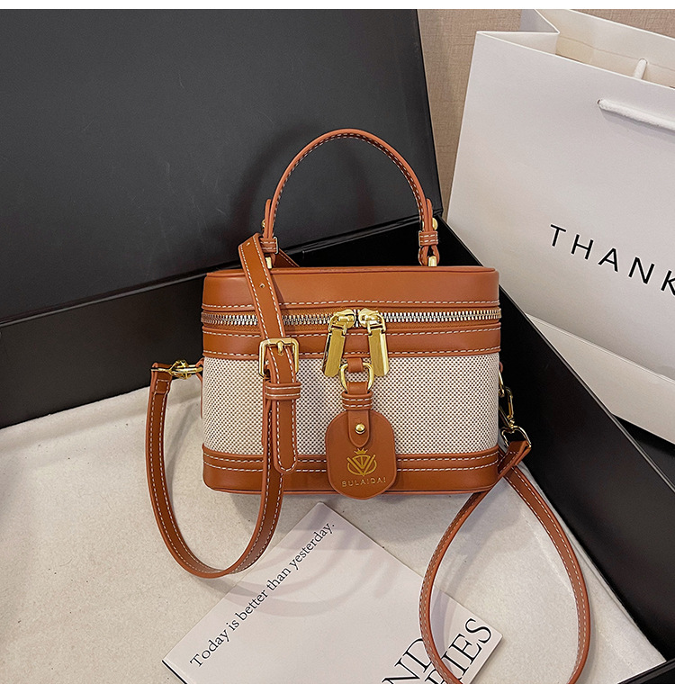 Bolso de mano de alta sensación para mujeres 2025, nueva moda transfronteriza, bolso de caja de empalme de color, bolso casual, bolso cuadrado simple