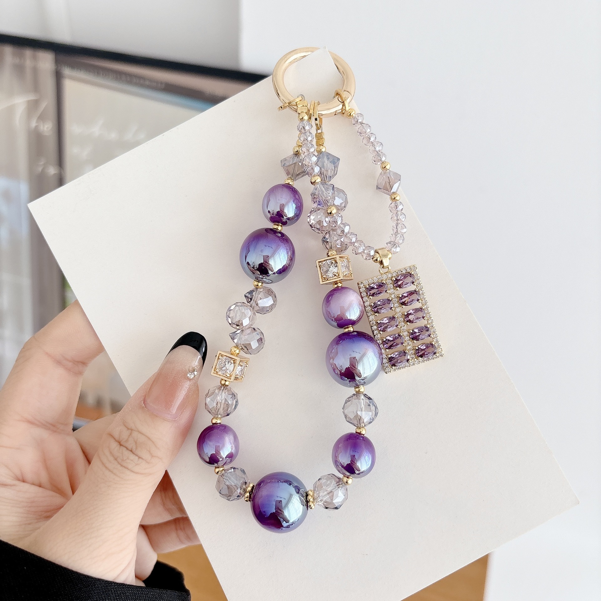 Alta sensación de lujo ligero zircon abaco serie de cadena de teléfono móvil cadena de teléfono móvil bolso llavero colgante nicho diseño