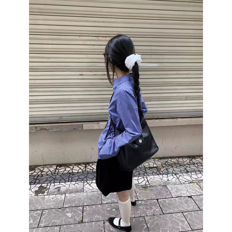 Blue colored spring shirt, with embroidery