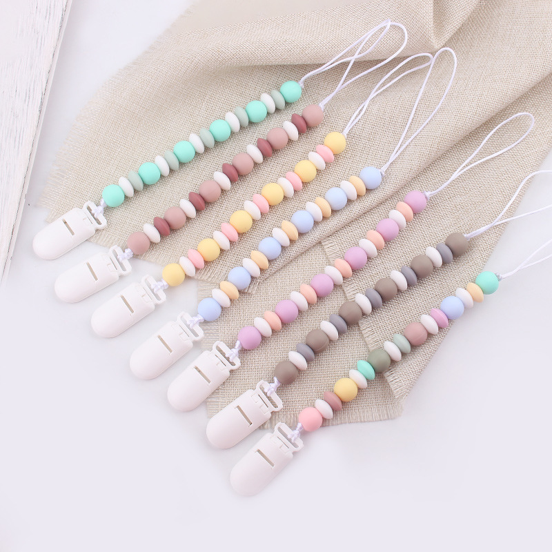 Nuevos productos para bebés cadena de tetas para calmar al bebé dibujos animados DIY color silicona mordida cadena de tetas cadena anti-caída cadena