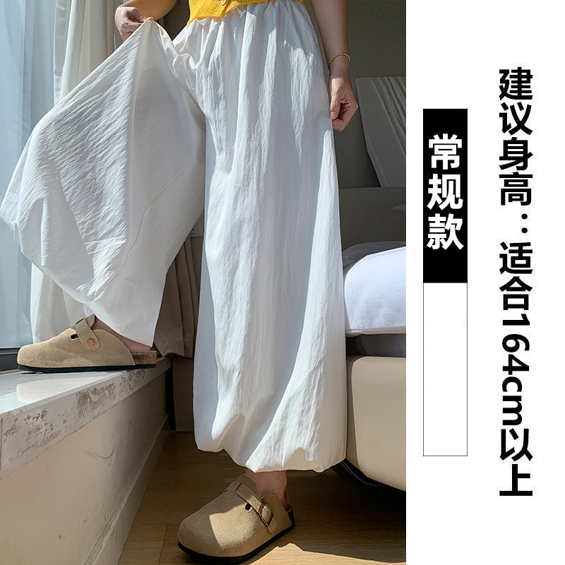 Pantalones de falda de capullo de flor de seda de hielo para mujer estilo fino de verano 2025 nuevo estilo casual perezoso pantalones de pierna ancha pequeños bombachos amarillos