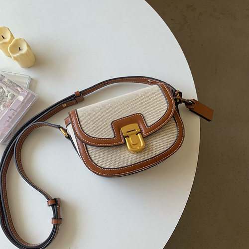 New Korean niche design leather stitching canvas contrasting retro versatile saddle bag small square bag single shoulder crossbody bag