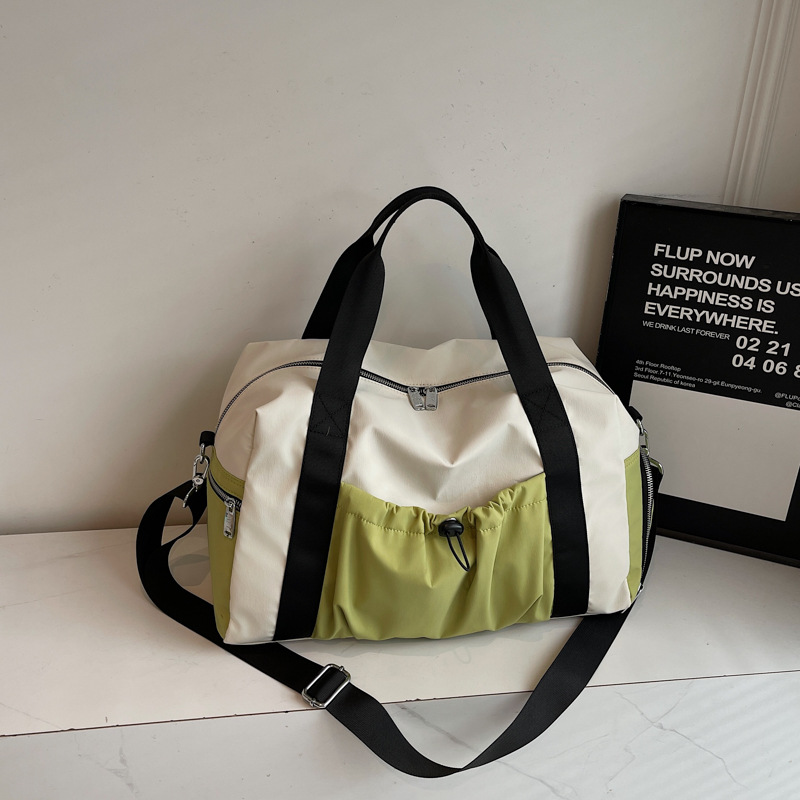 Bolsas deportivas de gran capacidad de ocio, bolsas de viaje de hombro simples de moda para mujeres, bolsas de mano ligeras de tirado.