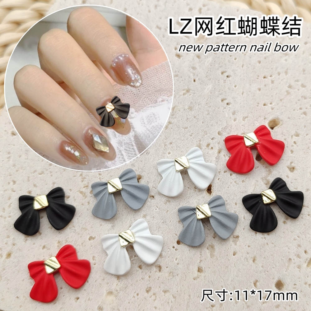 Japanese black accessory for manicure with bow