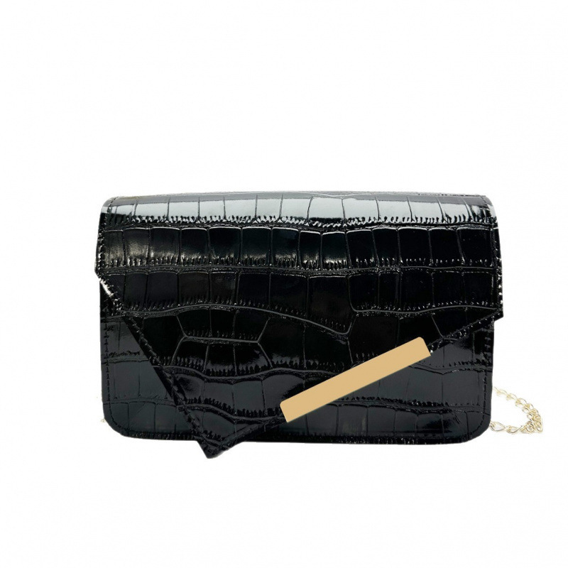 Una bolsa cuadrada con patrón de cocodrilo con tapa de tesoro de primavera y verano de 2025, nueva versión coreana de mujeres con un hombro inclinado, bolsa de cambio.