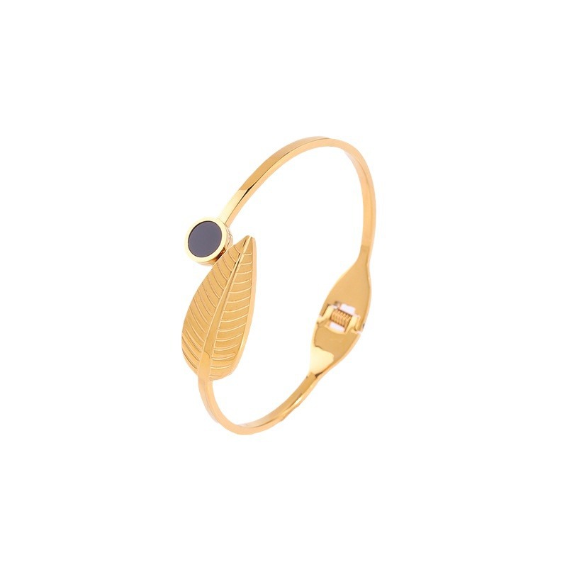 Fábrica directa pulsera de acero de titanio Europa y América alta sensación de resorte abierto pulsera de hoja de oro real chapado no decoloración joyería