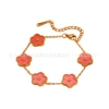 Five-leaf clover sparkling diamond and pink shell bracelet