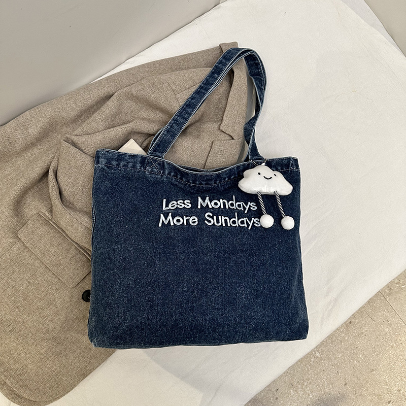 Bolsa de denim casual de gran capacidad para mujeres 2024 nueva bolsa de hombro de viaje, bolsa universitaria ligera y versátil
