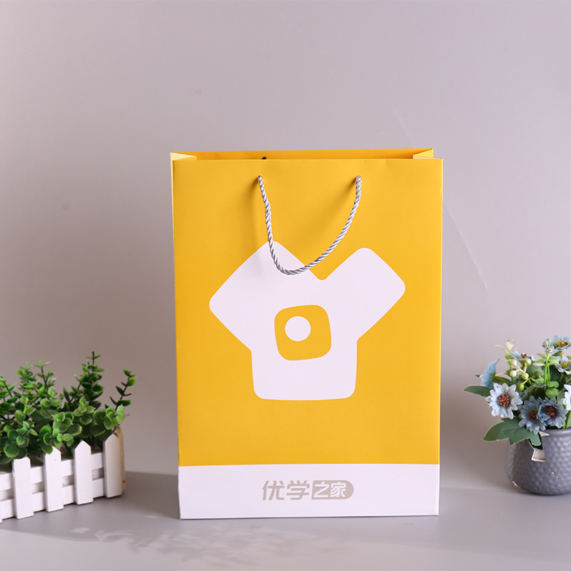 方底纸袋服装店购物包装袋圣诞节礼品袋高级感红酒眼镜手提袋制定