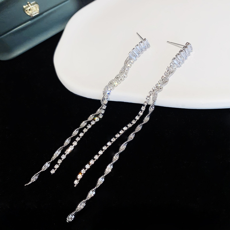 Elegant long earrings with zircon with tassels