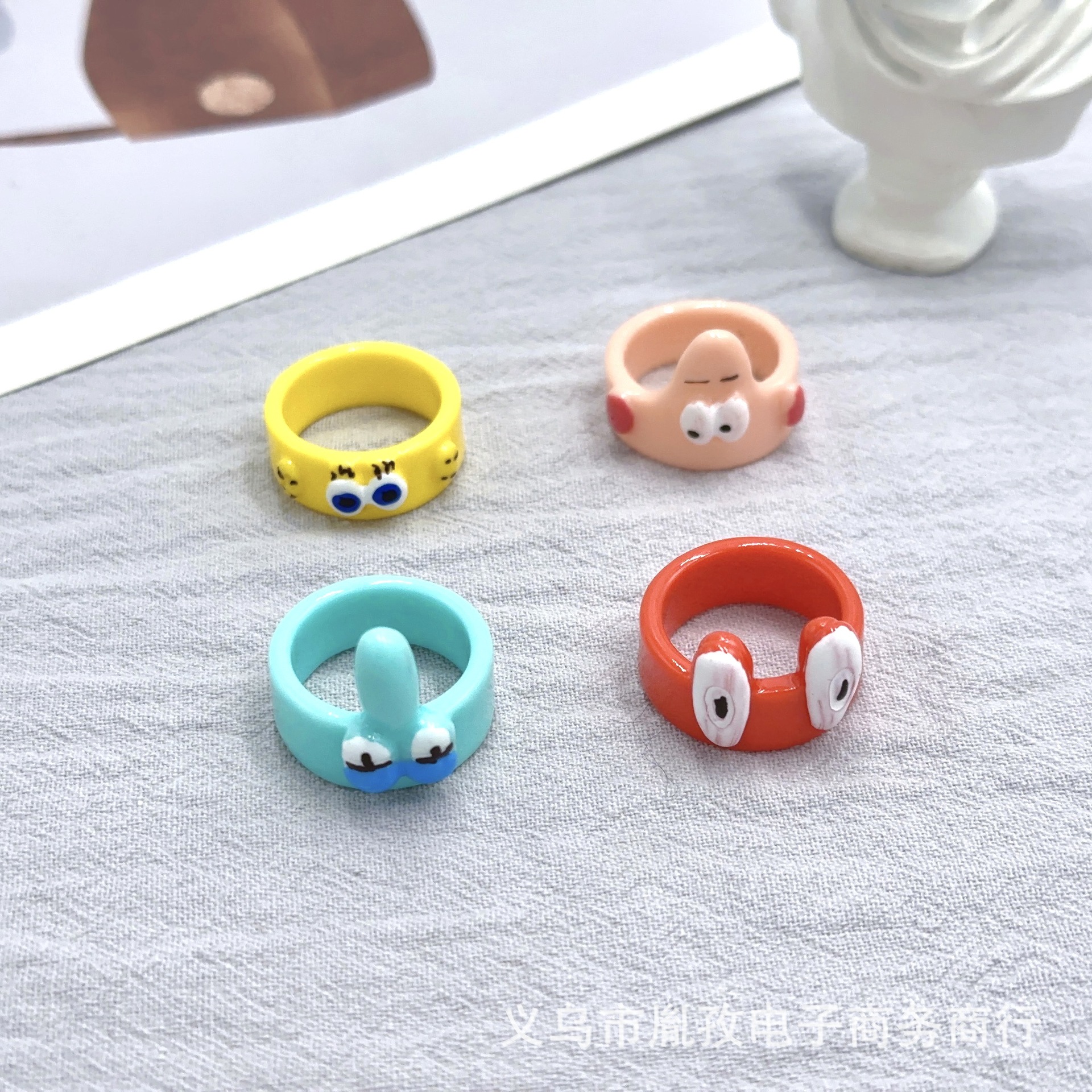 Nueva esponja del amigo bebé pintado anillo serie Paida estrella cangrejo jefe pulpo Pequeño Libro Rojo mismo estilo