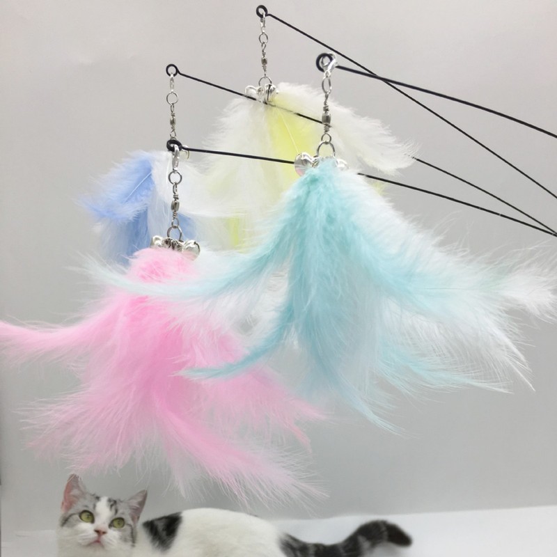 星智猫の猫のおもちゃの長い竿のワイヤーは鈴のふわふわしている羽を持って頭を換えて退屈します。|undefined