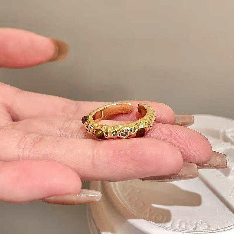 With a forged pattern ring with stone