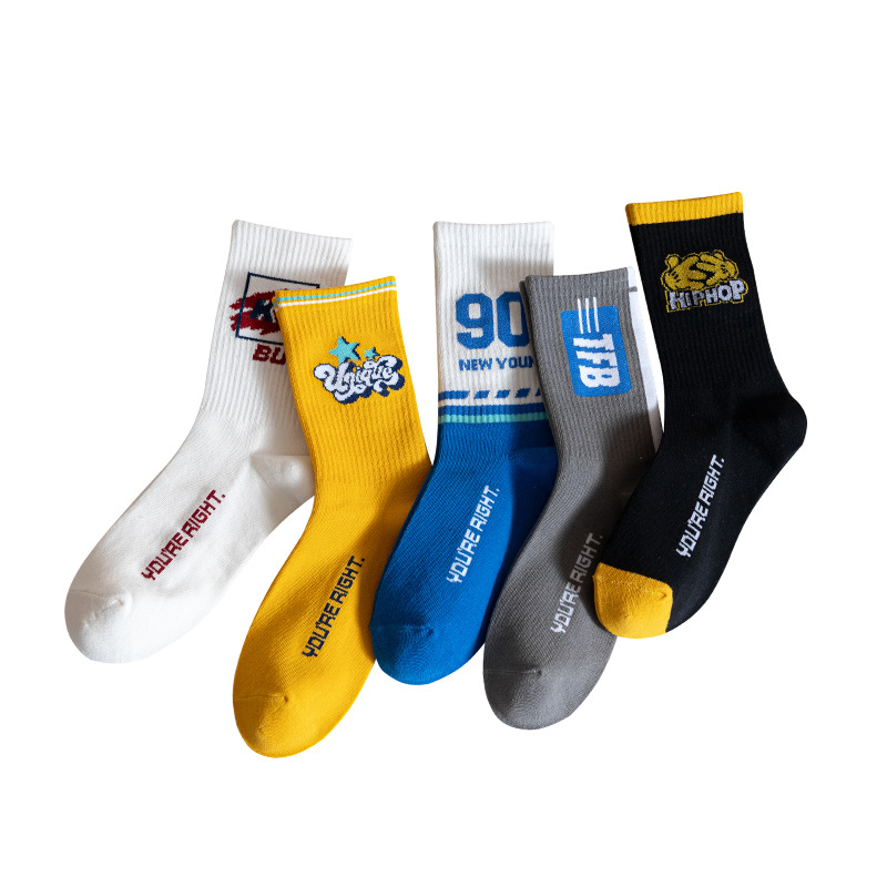 Calcetines de marea deportiva digital de algodón peinado Calcetines de algodón de color sólido calcetines de los hombres de otoño e invierno alta elástica calcetines marea al por mayor