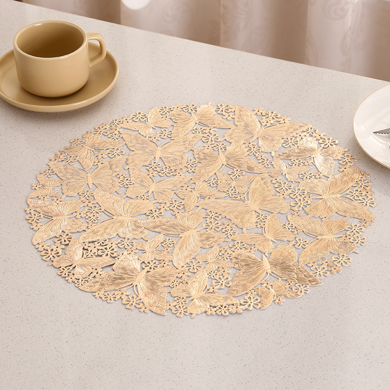 Diseño hueco de fábrica mariposa almohadilla impermeable a prueba de agua a prueba de aceite PVC almohadilla de taza de lujo ligera europea almohadilla de mesa INS almohadilla al por mayor