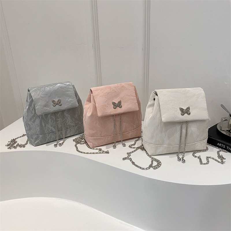 Borso de mariposa hueco de moda 2024 nuevo color sólido simple estilo de cadena de textura extranjera nicho de moda bolso de hombro