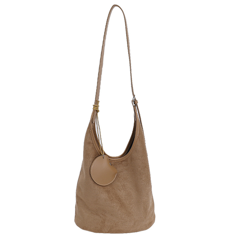 Bolsa de cubo retro transfronteriza para mujeres otoño y invierno 2025, nueva moda, bolso de hombro de moda, bolso de abrigo casual universal