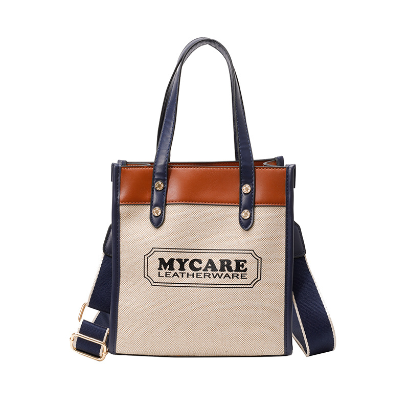 Bolso de mochila para mujeres 2025 nuevos productos transfronterizos de color de mano vertical tote de alta calidad bolsa de compras de transporte