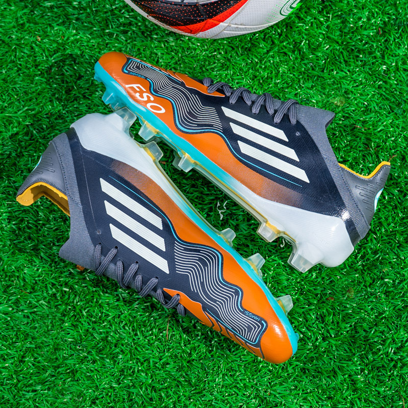 Nuevos zapatos de fútbol transfronterizos AG clavos hombres y mujeres clavos triturados entrenamiento anti-desgaste juvenil comercio exterior zapatos de fútbol