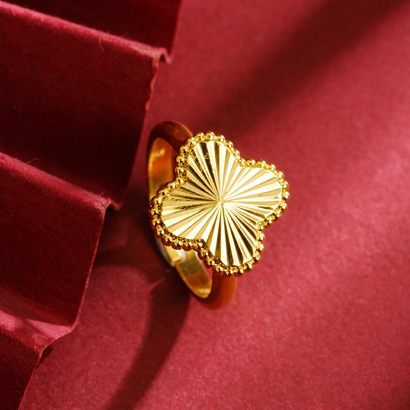 J23446 anillo de flores de cuatro hojas