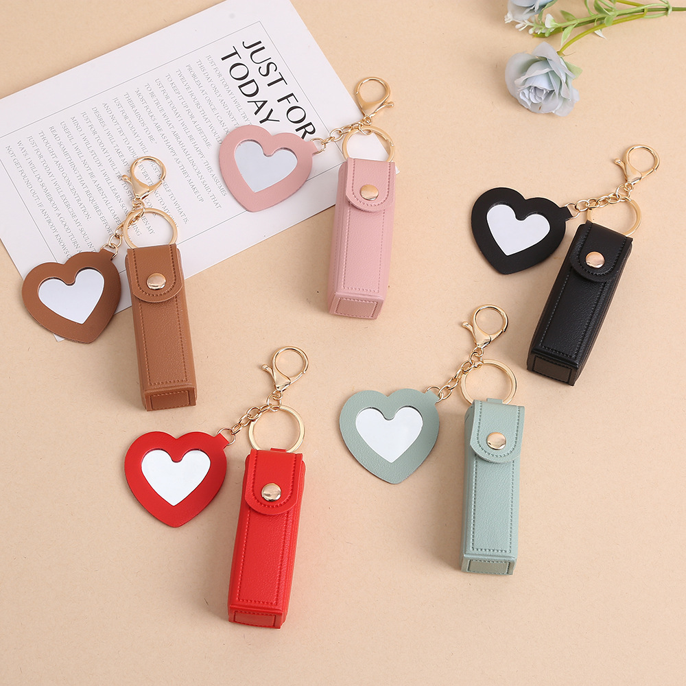 Nuevo bolso de almacenamiento de lápiz labial simple sensación de alto nivel hermoso llavero pu cuero mochila colgante accesorios de ropa