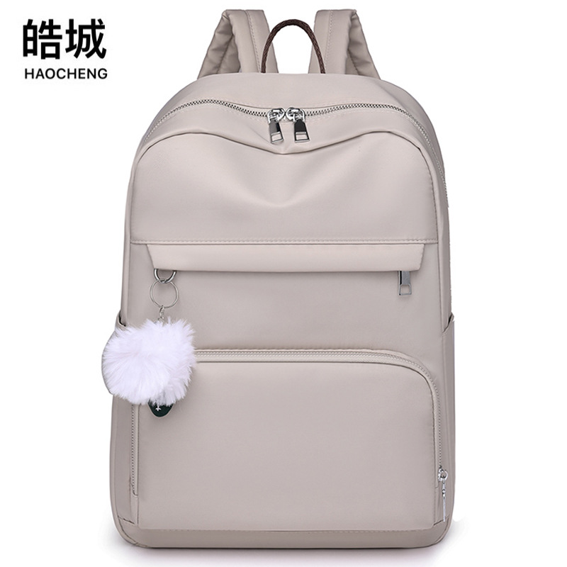 Comercio exterior al por mayor primavera nueva casual mujer mochila de nylon de gran capacidad de 14 pulgadas portátil mochila de moda