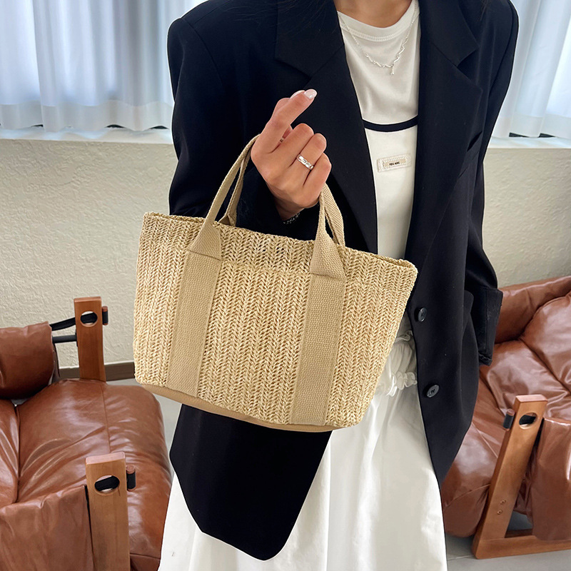 2026 nuevo bolso de paja de verano de gran capacidad para mujeres bolso de balde de tejido japonés simple bolso de playa de viaje